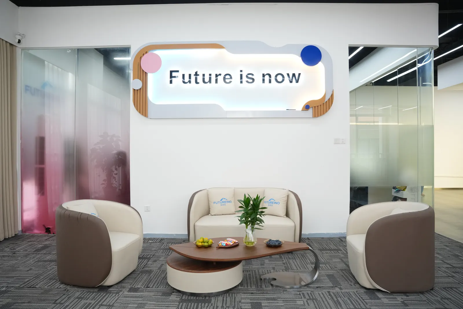 Futureino visitor lounge with 'Future is now' sign