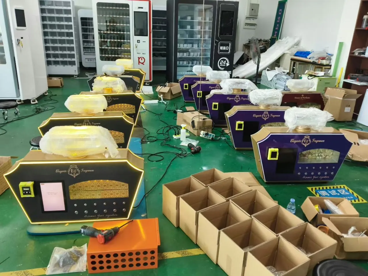 A batch of Perfume Station machines on the test floor of the Futureino factory in Guangzhou